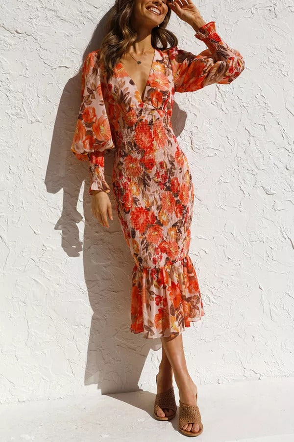 Robe midi fleurie à taille smockée