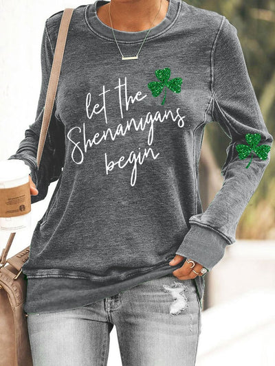 Damen Sweatshirt mit glitzerndem Kleeblatt-Motiv „Let the Shenanigans Begin“ 