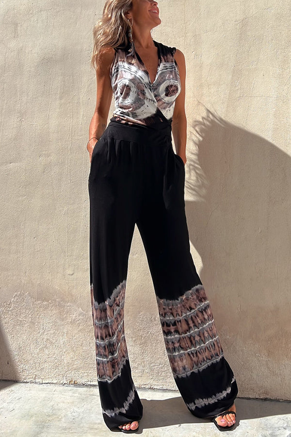 Kaycie Schlag-Jumpsuit aus Stretch-Baumwolle mit Batikmuster, Kapuze und Taschen 